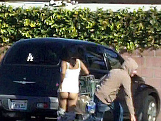 Pervert Guy runs up and pulls some radom lady's shorts down in the supermarket parking lot...