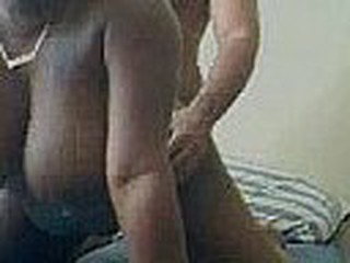 Horny and naughty couple get nasty in their bedroom in this real sex video. This ebony with saggy big tits gets rammed from behind doggy style causing her tits to sway back and forth.